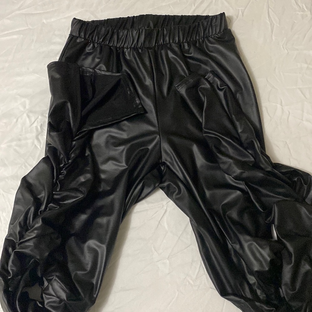Leather pants with the splits at the bottom